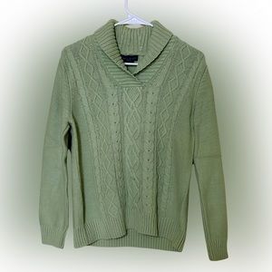 A soft green sweater of KAREN SCOTT and the size is medium.